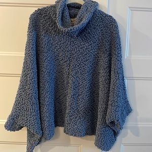 Blue sweater.